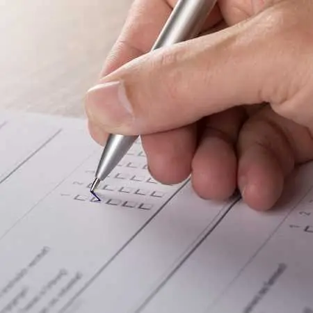 close up of person filling in a form