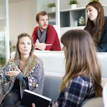 group of staff talking together